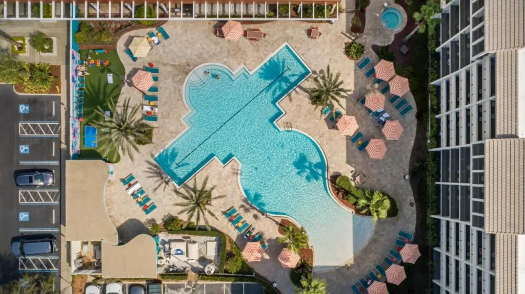 Aerial view of the pool, hot tub and games lawn at Holiday Inn Orlando Disney Springs