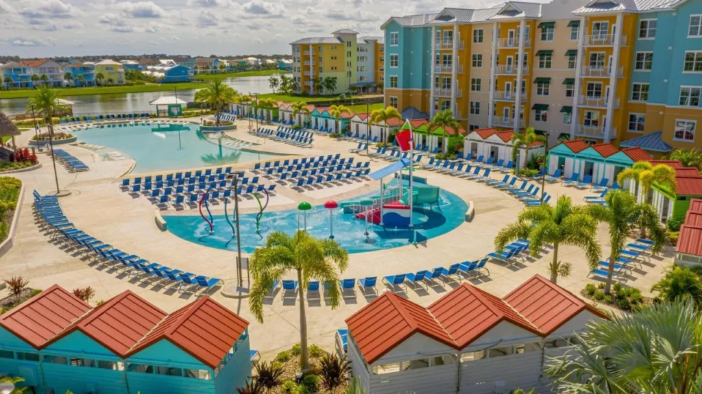 Aerial view of the pool, splash pad and cabanas at Embassy Suites Orlando Sunset Walk