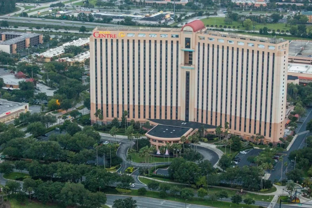 Aerial view of the Rosen Centre Hotel tower, entrance rotunda, fountains and palm-lined drive