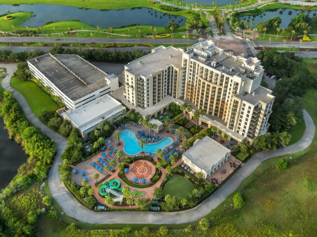 Aerial view of the towers, pool and waterslide at Las Palmeras, a Hilton Grand Vacations Club