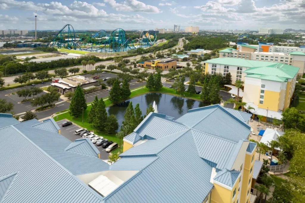 Aerial view toward SeaWorld roller coasters with SpringHill Suites Orlando at SeaWorld on the right