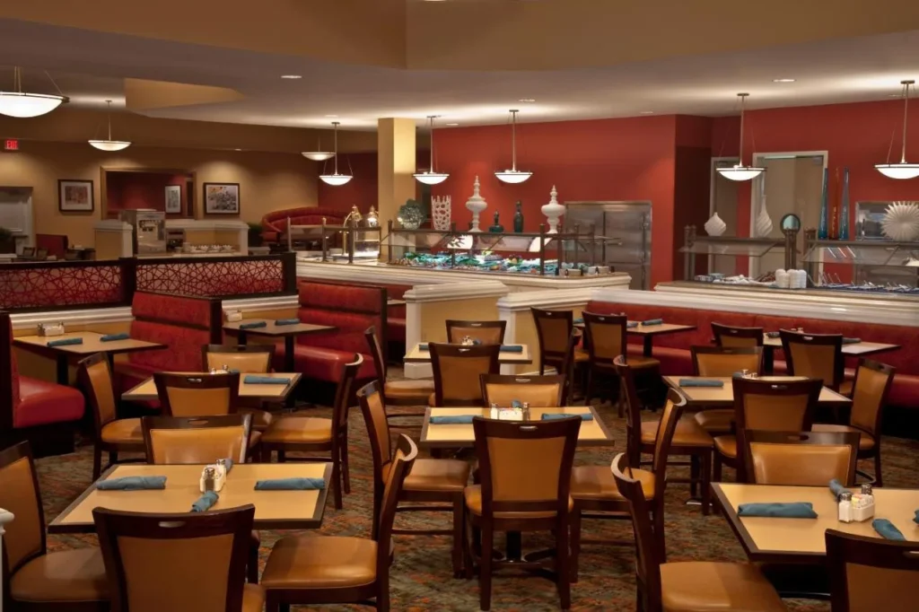 Cafe Matisse buffet restaurant with booths and serving stations at Rosen Plaza Hotel