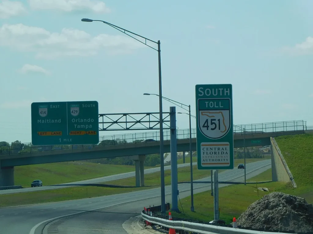 Central Florida Expressway Authority SR 451 toll shield beside signs for SR 414 and SR 429