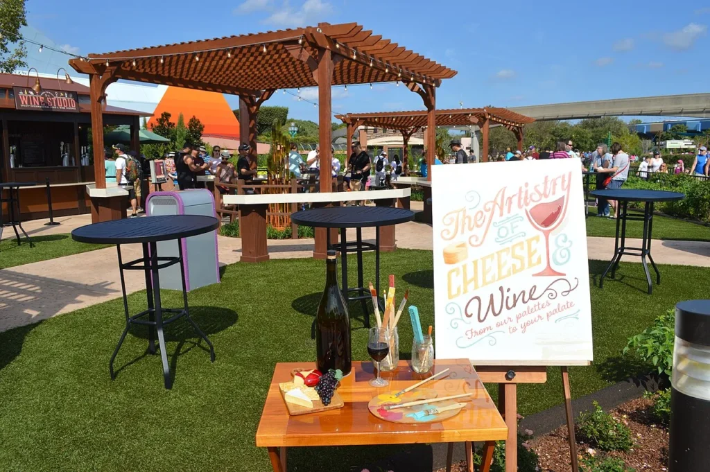 Cheese-and-wine display, Wine Studio booth and pergolas at EPCOT's Food and Wine Festival