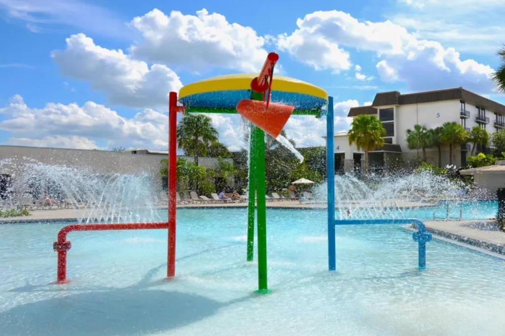 Children's water playscape with spray jets and a tipping bucket at Wyndham I-Drive Avanti Resort