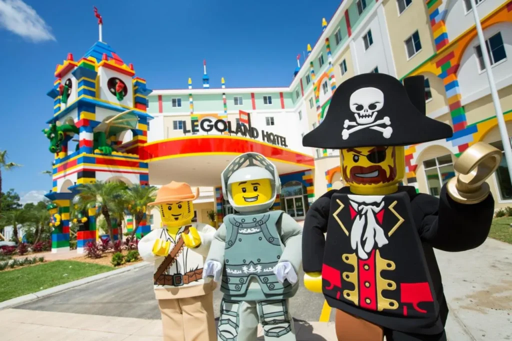 Costumed LEGO characters outside the LEGOLAND Hotel entrance at LEGOLAND Florida Resort