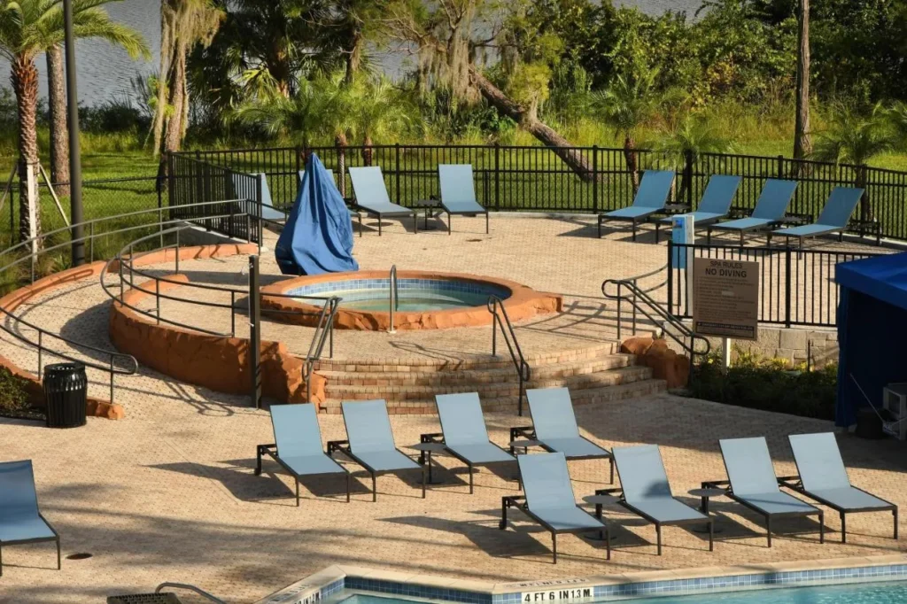Elevated hot tub and loungers above the pool deck at Wyndham Lake Buena Vista