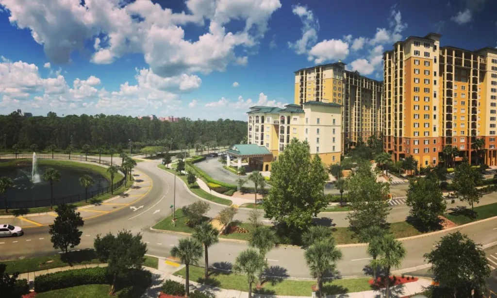 Entrance drive, fountain pond and towers of Lake Buena Vista Resort Village & Spa
