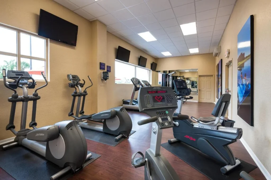 Fitness center with ellipticals, treadmills and a recumbent bike at Westgate Palace in Orlando