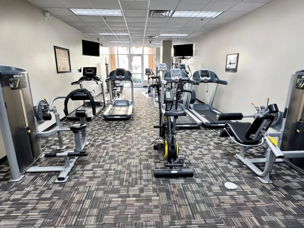 Fitness center with treadmills, an exercise bike and weight machines at Lake Buena Vista Resort Village