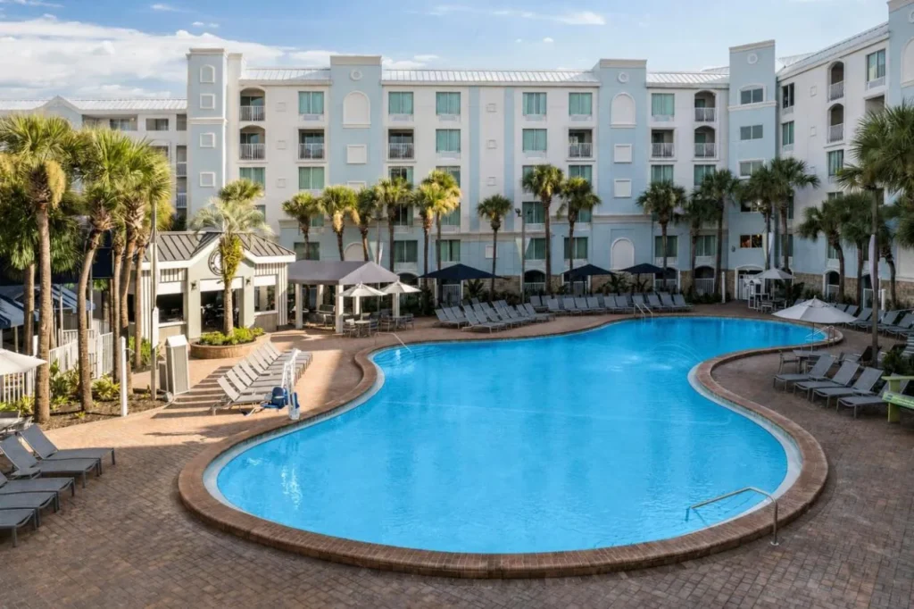 Free-form courtyard pool and loungers at Holiday Inn Resort Orlando Lake Buena Vista