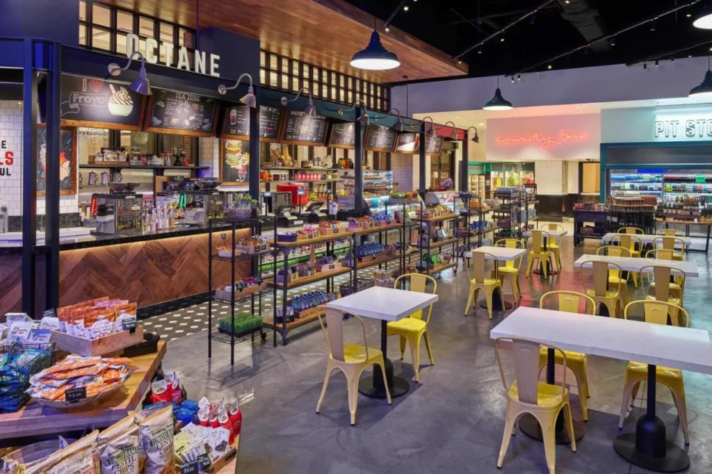 Fuel market with coffee counter, snacks and yellow cafe chairs at Walt Disney World Dolphin
