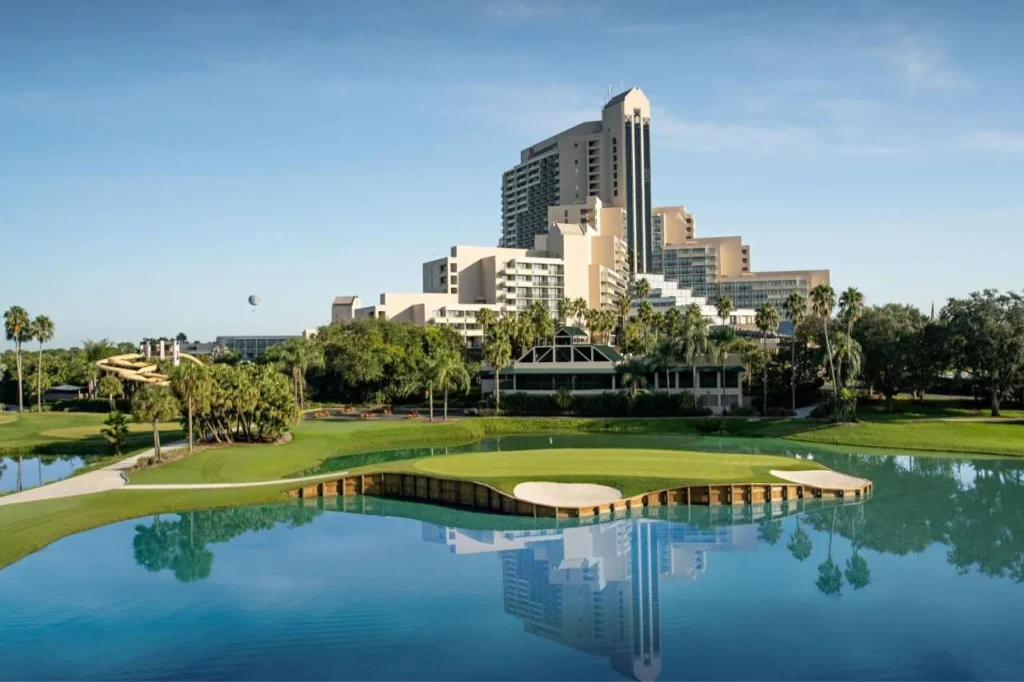 Hawk's Landing island green and lake in front of the Orlando World Center Marriott tower