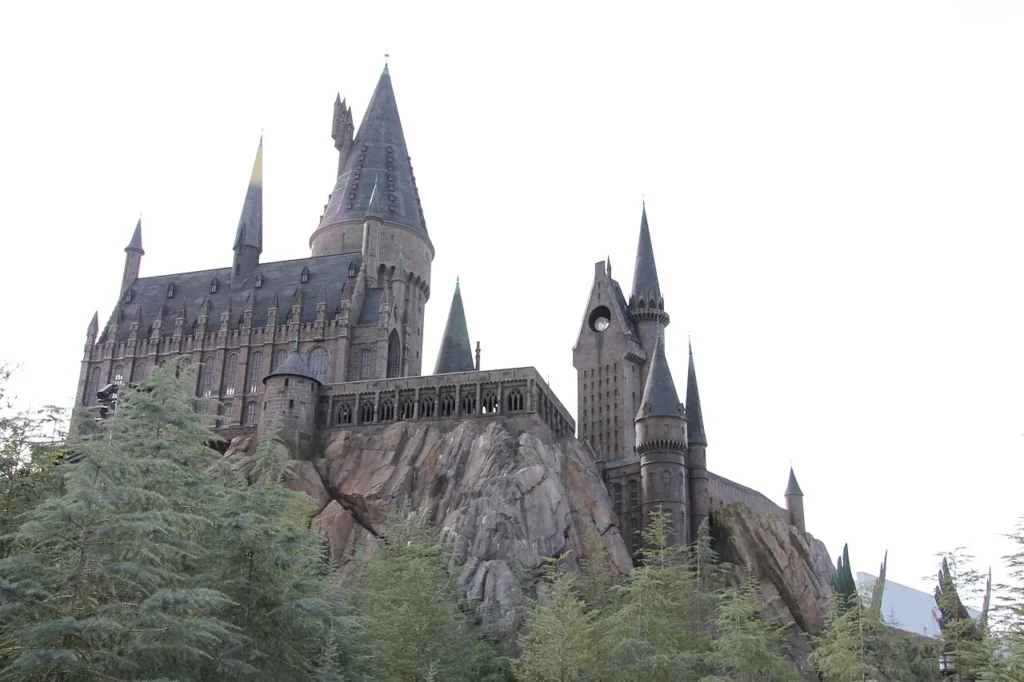 Hogwarts Castle on its rocky cliff above the trees at Universal Islands of Adventure