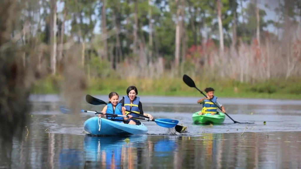 Kayakers paddling on the water at Holiday Inn Club Vacations at Orange Lake Resort