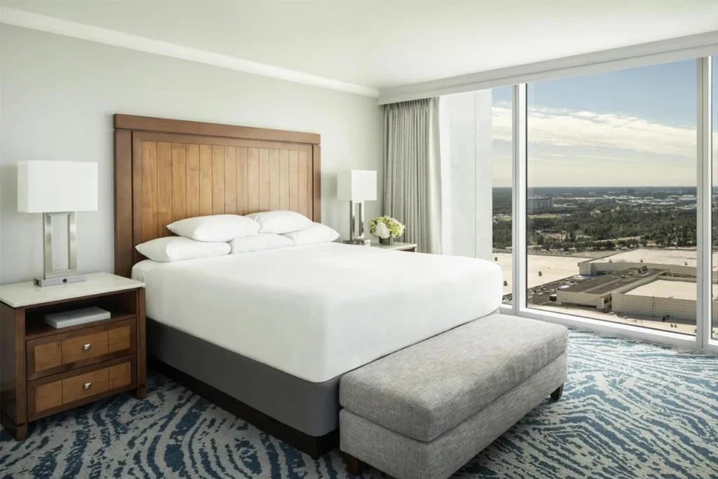 King bedroom with floor-to-ceiling windows and a high-floor view at Hyatt Regency Orlando