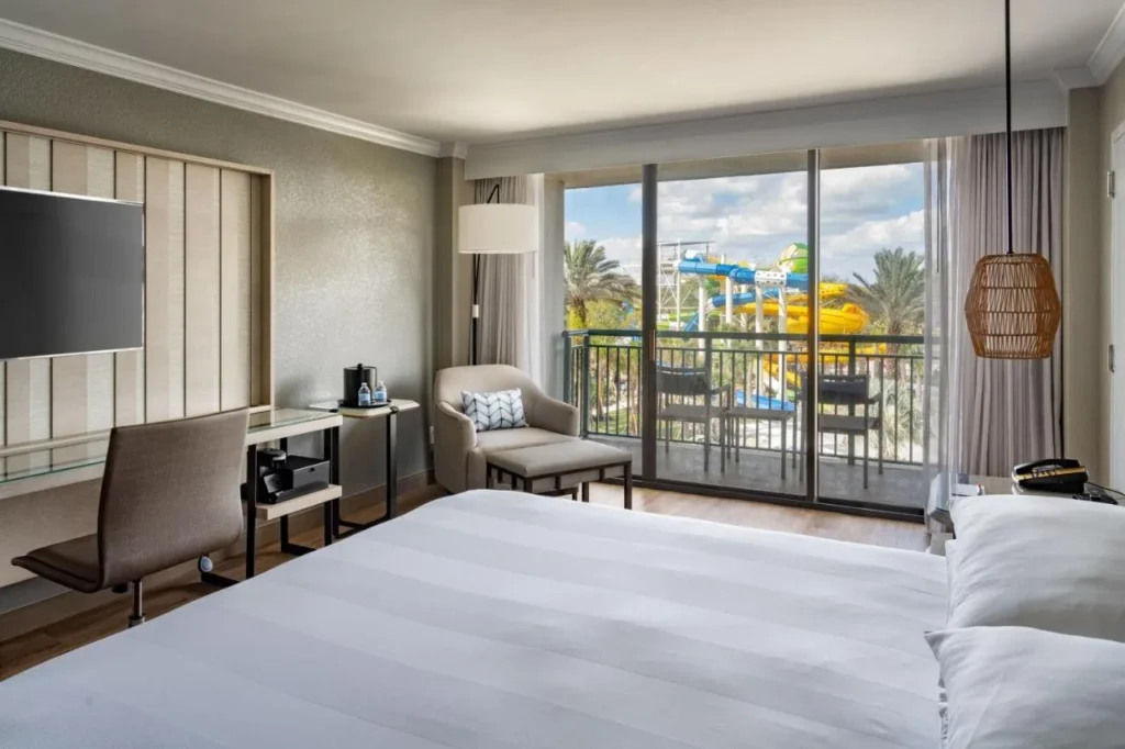 King room at Orlando World Center Marriott with a balcony facing water park slides
