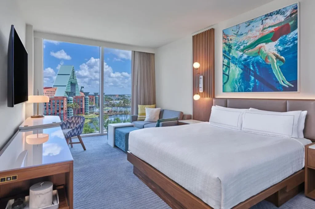 King room with tall windows facing the Dolphin at Walt Disney World Swan Reserve