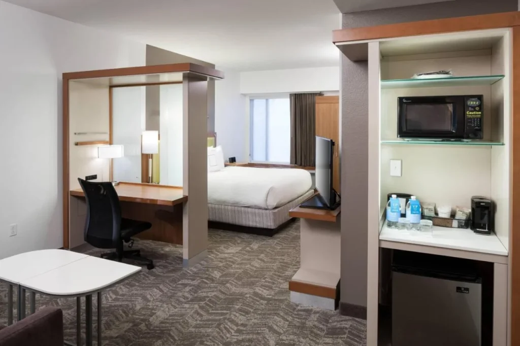 King suite with work nook, microwave, coffee maker and mini fridge at SpringHill Suites at SeaWorld