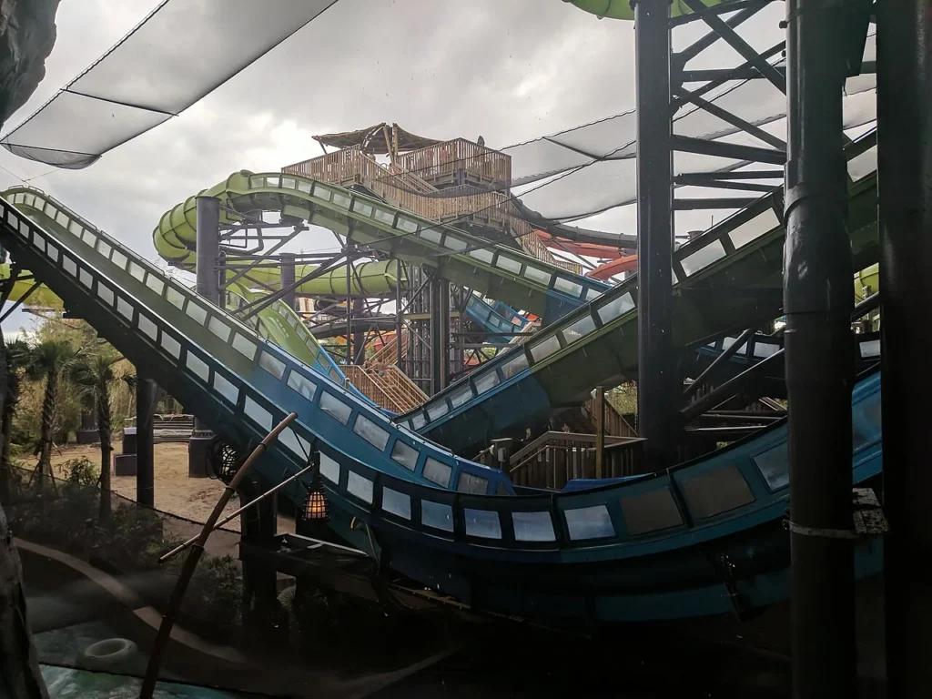 Krakatau Aqua Coaster blue flume and slide towers seen from below at Universal Volcano Bay