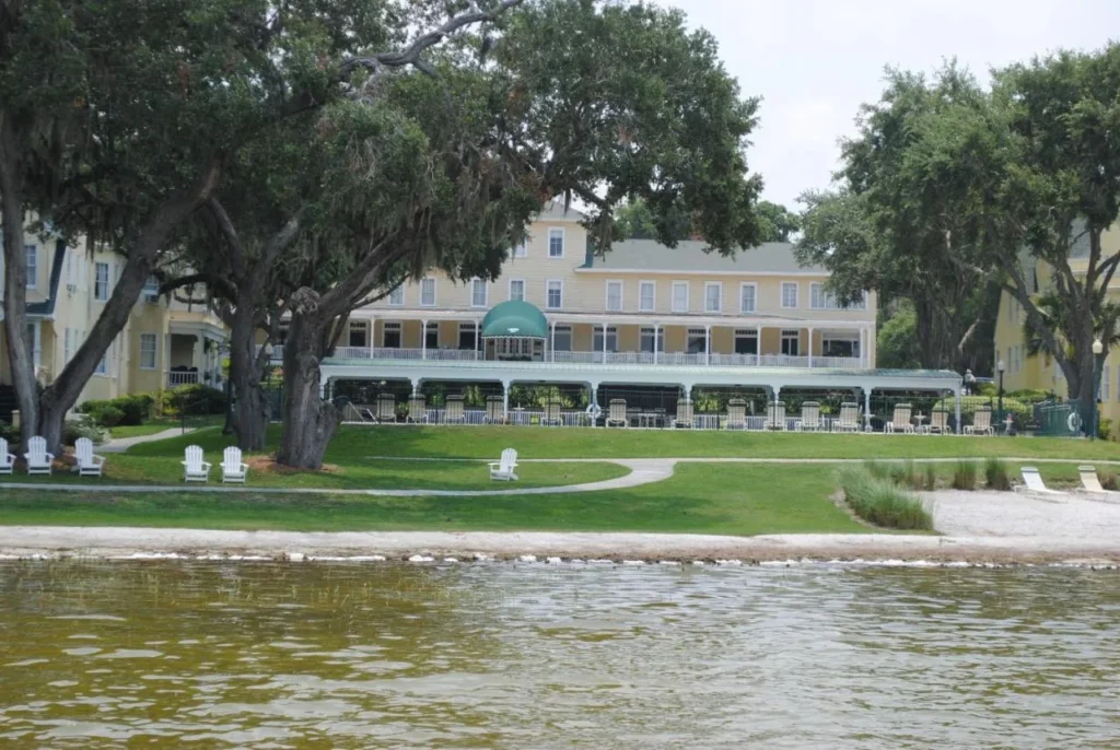 Lakeside Inn verandah and lawn seen from Lake Dora in Mount Dora, Florida