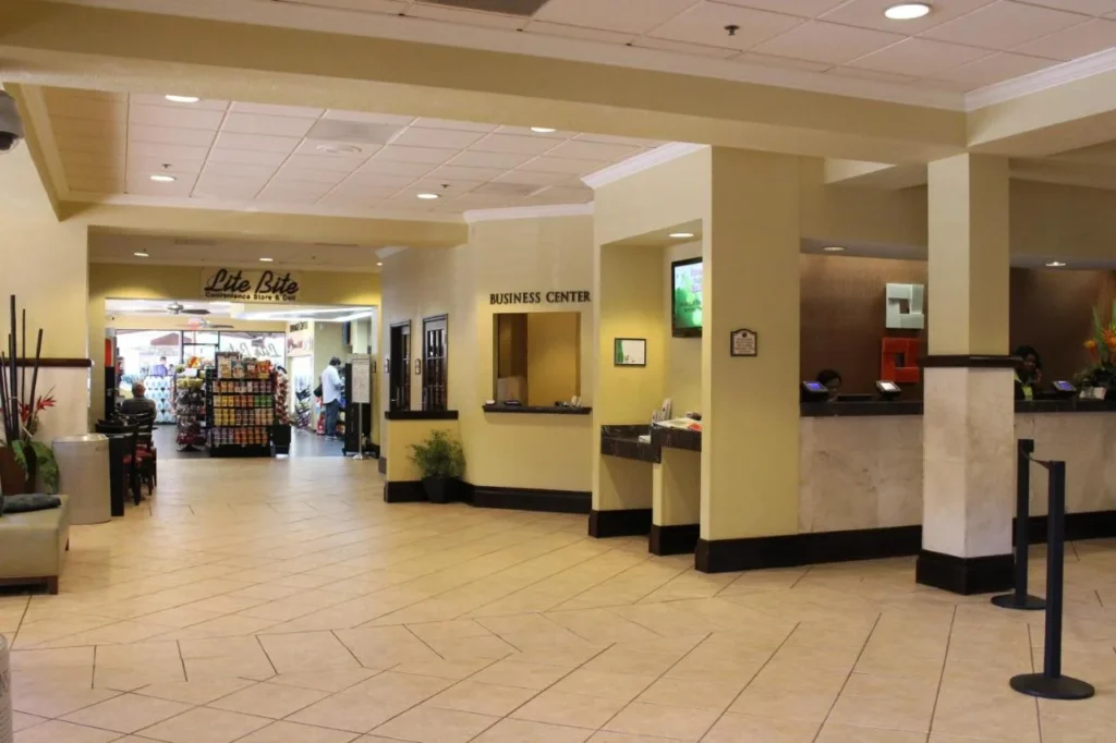 Lobby front desk, business center and Lite Bite store at Rosen Inn at Pointe Orlando