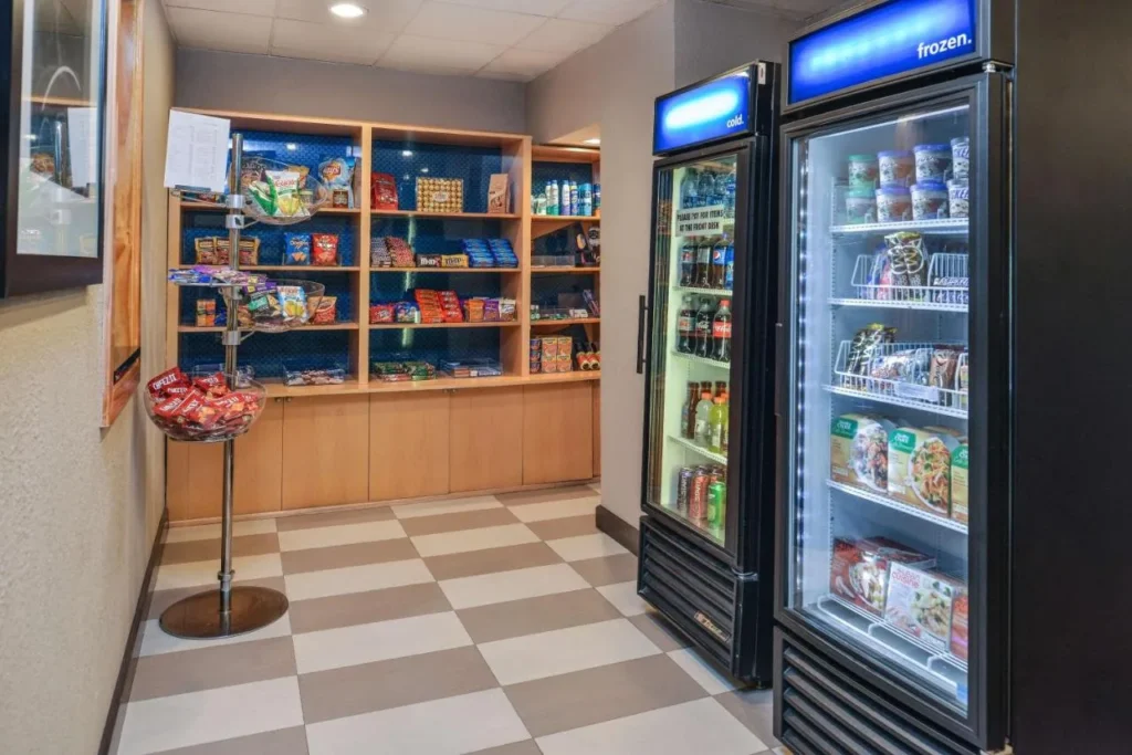 Lobby shop with snacks, cold drinks and frozen meals at Hampton Inn Closest to Universal