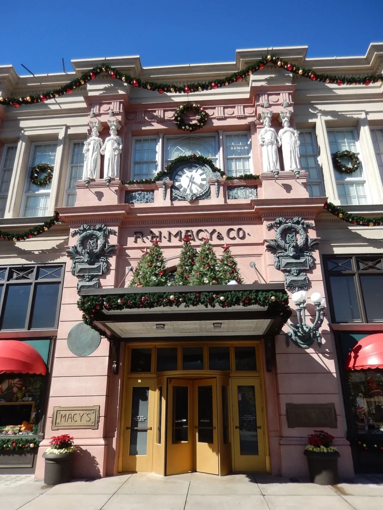 Macy's facade decorated with garlands, wreaths and Christmas trees, New York area of Universal Studios Florida