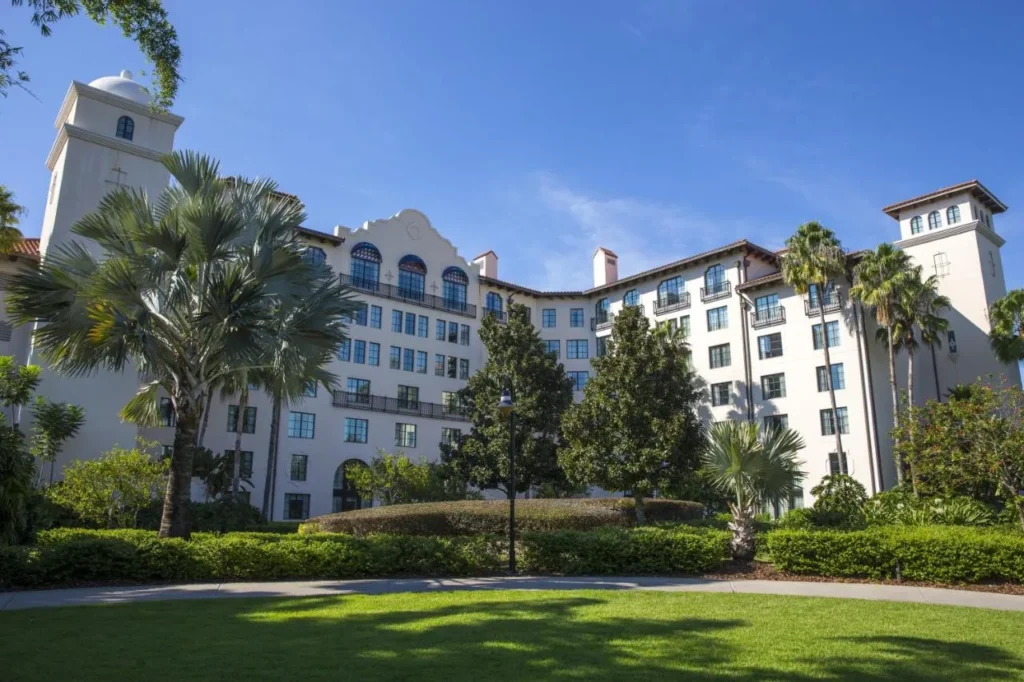 Mission-style facade with bell towers and palm trees at Hard Rock Hotel at Universal Orlando