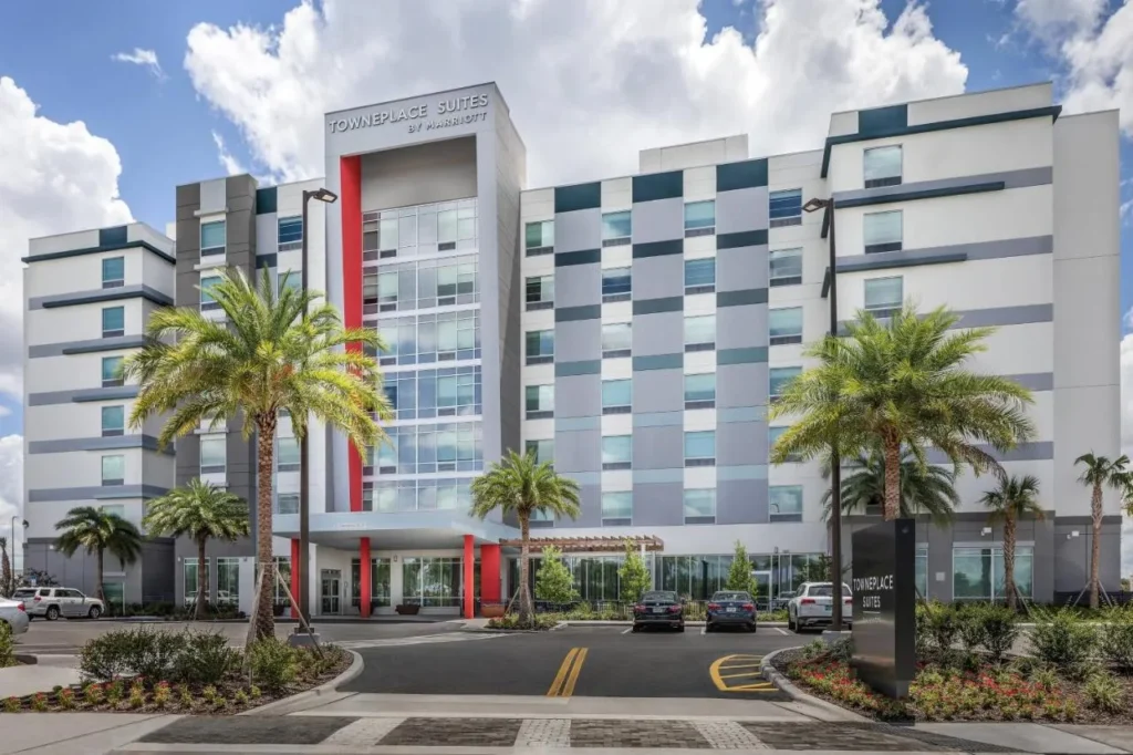 Modern exterior and entrance drive of TownePlace Suites by Marriott Orlando Near Universal