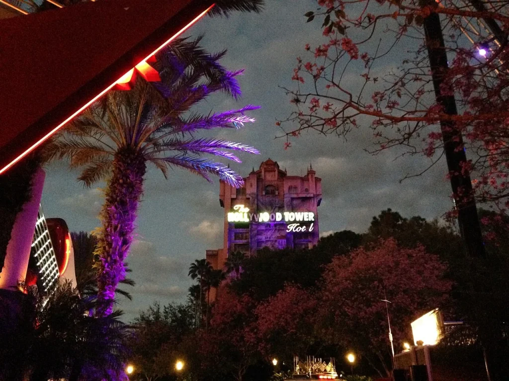 Neon Hollywood Tower Hotel sign on Tower of Terror at dusk, Disney's Hollywood Studios