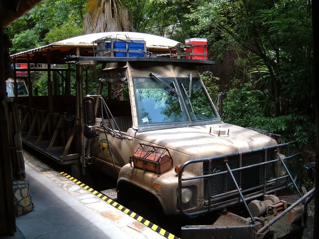 Open-sided Kilimanjaro Safaris ride vehicle waiting at the loading area in Disney's Animal Kingdom