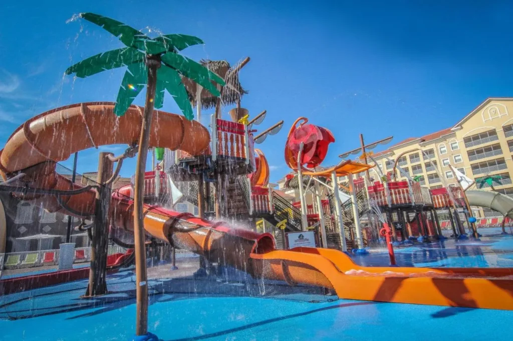 Pirate ship water slides and palm tree fountain at Shipwreck Island, Westgate Town Center Resort