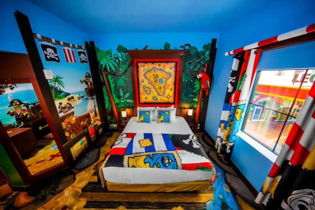 Pirate-themed king room with treasure map headboard at Pirate Island Hotel, LEGOLAND Florida