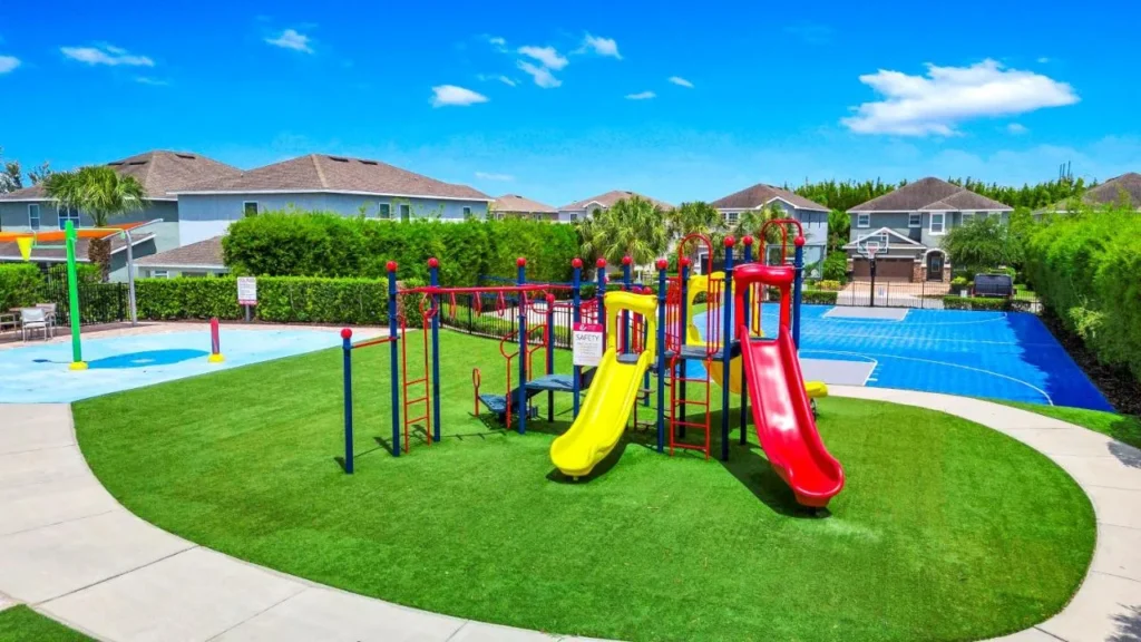 Playground, splash pad and basketball court at the East Side Amenity Center, Encore Resort