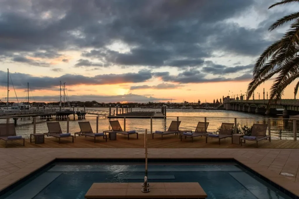 Plunge pool deck facing Matanzas Bay and the Bridge of Lions at sunset, Marker 8 Hotel & Marina