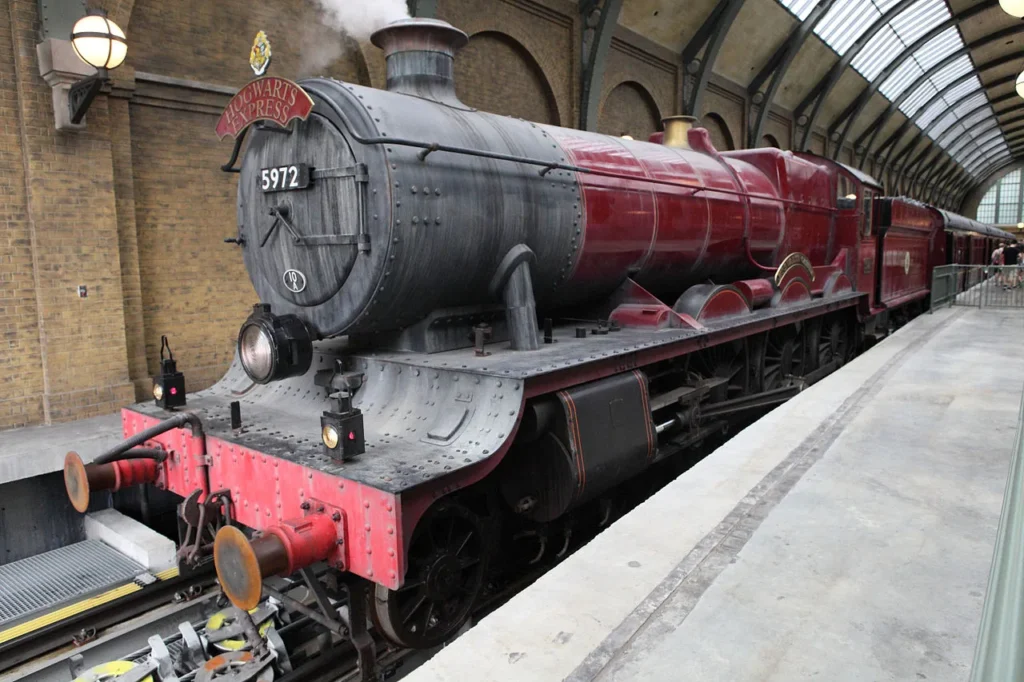Red steam-style Hogwarts Express locomotive 5972 at the King's Cross Station platform, Universal Studios Florida