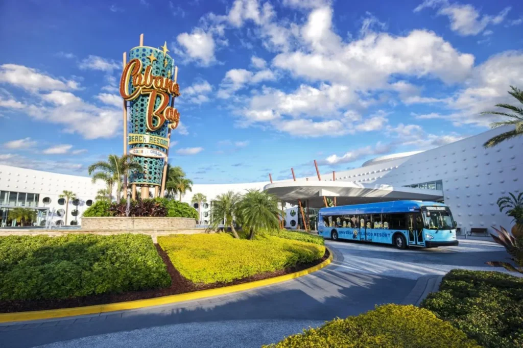 Retro sign and a Universal shuttle bus at the entrance, Universal Cabana Bay Beach Resort