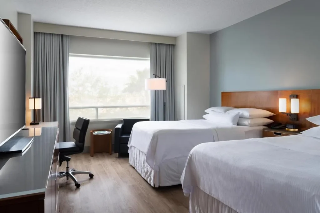 Room with two beds, a desk and a window at The Westin Lake Mary, Orlando North
