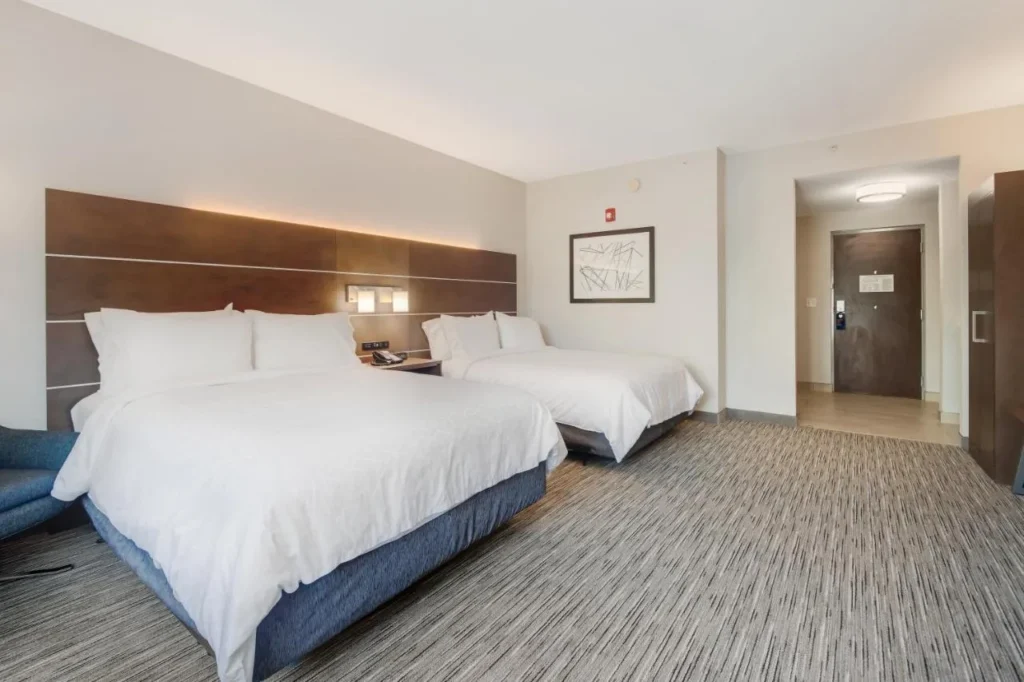 Room with two queen beds at Holiday Inn Express & Suites Orlando - Apopka