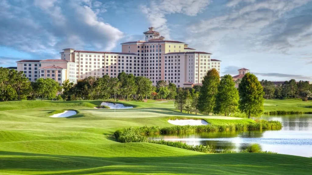 Shingle Creek Golf Club green, bunkers and pond in front of Rosen Shingle Creek