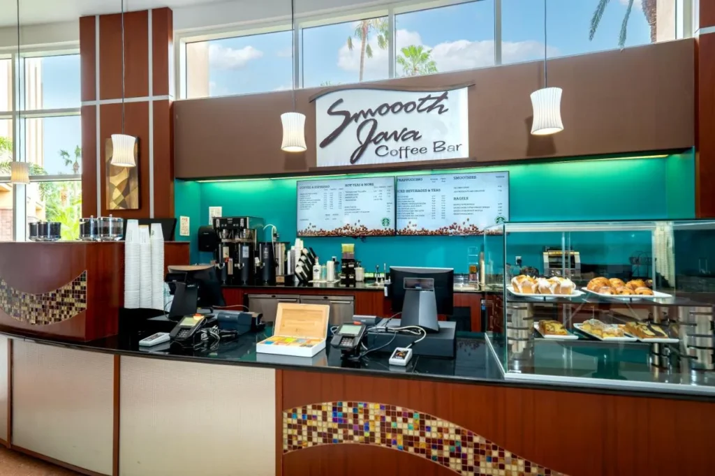 Smoooth Java coffee bar counter with pastry case and menu boards at Rosen Centre