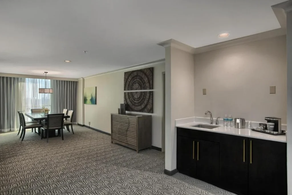 Suite dining table and wet bar with a sink at DoubleTree at the Entrance to Universal