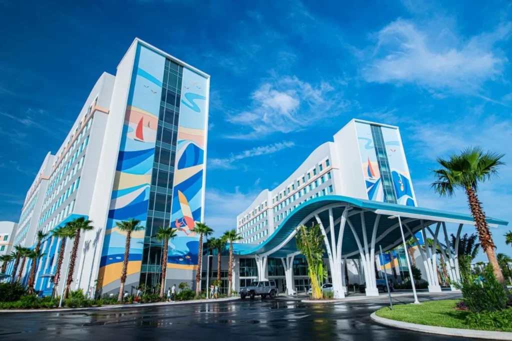 Surf-mural towers and wave-shaped entrance canopy at Universal Endless Summer Resort Surfside Inn and Suites