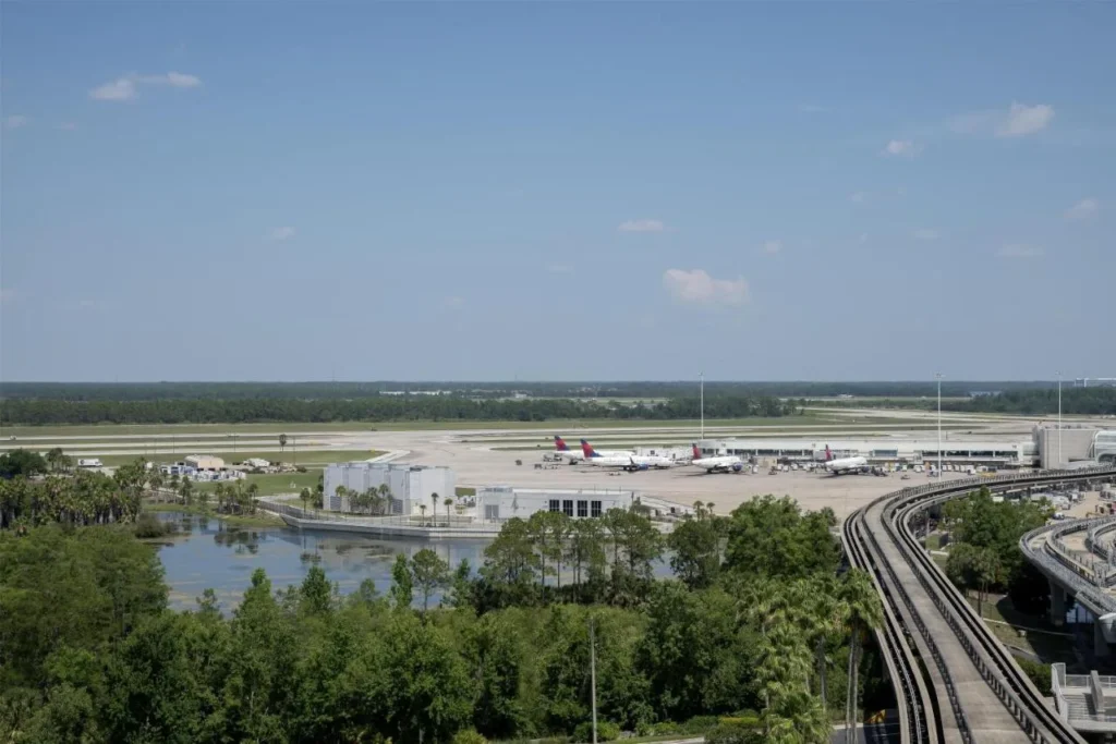 View over the MCO airfield, parked jets and people mover from Hyatt Regency Orlando International Airport