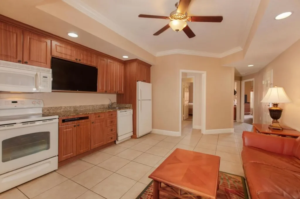 Villa kitchen with full-size oven, dishwasher and refrigerator at Westgate Town Center Resort