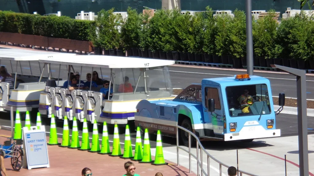 Walt Disney World courtesy tram carrying guests through the EPCOT parking lot
