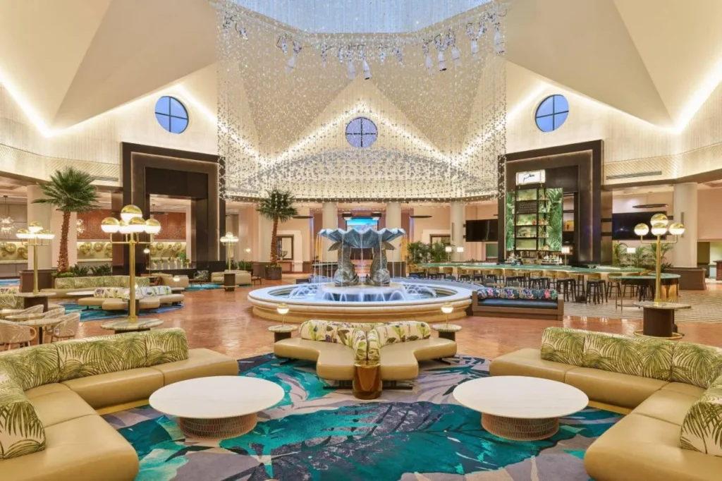 Walt Disney World Dolphin lobby with its dolphin fountain, lounge seating and bar
